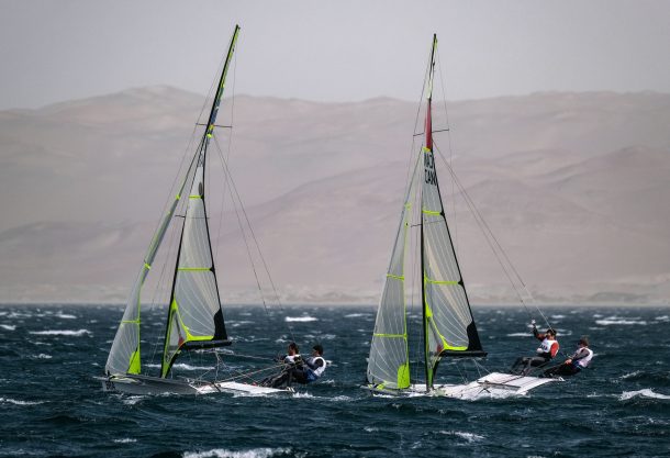 Friday August 09, 2019 - Marco Grael and Gabriel Borges from Brazil, left, Alexander Heinzemann and Justin Barnes from Canada, right, during the medal race of  During Men’s Skiff of Sailing at the Bahia de Paracas at the Pan American Games Lima 2019. Copyright  Guillermo Arias / Lima 2019   Mandatory credits: Lima 2019 ** NO SALES ** NO ARCHIVES **