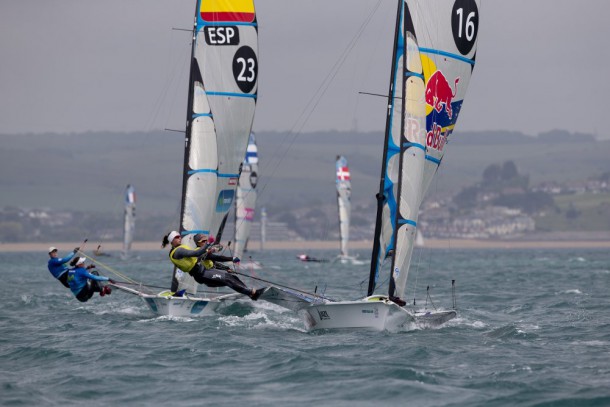 20150613 Copyright onEdition 2015© Free for editorial use image, please credit: onEdition Tamara Echegoyen and Berta Betanzos Moro, ESP, Alexandra Maloney and Molly Meech, NZL, Women's Skiff (49erFX) on day four of the ISAF Sailing World Cup Weymouth & Portland. Returning to the London 2012 Olympic waters, the ISAF Sailing World Cup Weymouth and Portland is taking place between 8-14 June with the racing conducted over five days between 10-14 June at Weymouth and Portland National Sailing Academy. Medal race day on Sunday 14 June will decide the overall event winners in each class. Follow ISAF Sailing World Cup Weymouth and Portland on Twitter - @SailingWC_GBR and Facebook - www.facebook.com/ISAFSailingWorldCup website: http://www.sailing.org/worldcup/regattas/weymouthandportland_2015.php For more information please contact:Pippa Phillips pippa.phillips@intotheblue.biz +44(0)7967 705697 Supported by: UK Sport #EveryRoadToRio, RYA, Icom, SLAM, Volvo Car UK, Yamaha.  If you require a higher resolution image or you have any other onEdition photographic enquiries, please contact onEdition on 0845 900 2 900 or email info@onEdition.com This image is copyright onEdition 2015©. This image has been supplied by onEdition and must be credited onEdition. The author is asserting his full Moral rights in relation to the publication of this image. Rights for onward transmission of any image or file is not granted or implied. Changing or deleting Copyright information is illegal as specified in the Copyright, Design and Patents Act 1988. If you are in any way unsure of your right to publish this image please contact onEdition on 0845 900 2 900 or email info@onEdition.com
